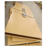 Two powered table tops with wood panel legs??