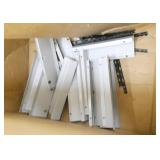Cubicle parts, 2 boxes floor/wall moulding, weird table/cube components