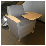 Chair with writing surface