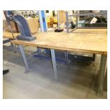 DAKE Arbor press 1-1/2 Ton mounted on a 72x36 workbench with wood top and steel legs, adjustable height