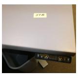 Adjustable height corner desk 48 inches each corner side against the wall