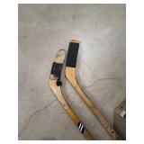 2 Christian Hockey Sticks & Approx. 20 Practice Pucks