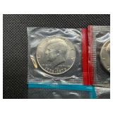 Four Kennedy Half Dollars Cut from Mint Package