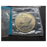 Four Kennedy Half Dollars Cut from Mint Package