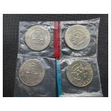 Four Kennedy Half Dollars Cut from Mint Package