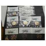 Seven State Quarters Uncircluated-60 and 2003 P&D Kennedy Half Dollar Uncirculated-60 in Littleton Packaging