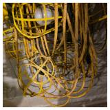 Lot of Extension Cords and Yellow Cage Work Lights