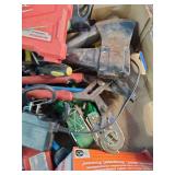 This box contains a mix of miscellaneous garage items, hand tools, small electronics, and personal care products.