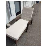 Outdoor resin wicker chaise lounge with adjustable backing and weather-resistant cushions,