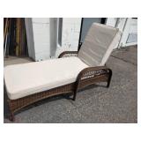 Outdoor resin wicker chaise lounge with adjustable backing and weather-resistant cushions,