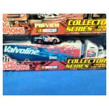 Racing Champions NASCAR Collectors Series transporter and die-cast stock car sets.