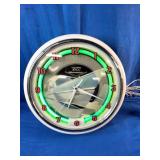 Neonetics 1957 Chevrolet neon clock with a chrome finish and hand-blown glass neon ring.