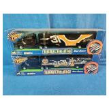 2  Robby Gordon #31 Cingular Wireless NASCAR trailer rigs from the 2002 Winner