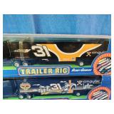 2  Robby Gordon #31 Cingular Wireless NASCAR trailer rigs from the 2002 Winner