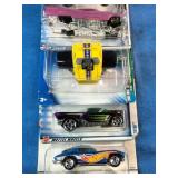 This collection contains a variety of vintage and specialized Mattel Hot Wheels carded die-cast cars spanning from the late 1990s through the mid-2000s.