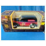 Pair of vintage die-cast vehicle collectibles in their original window display boxes.