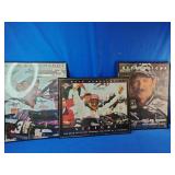 Three framed commemorative prints celebrating NASCAR driver Dale Earnhardt