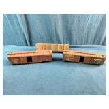 Athearn HO Scale freight cars, featuring a Southern Pacific boxcar and an automobile boxcar