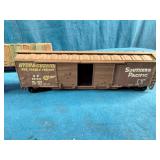 Athearn HO Scale freight cars, featuring a Southern Pacific boxcar and an automobile boxcar