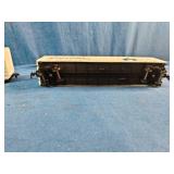 Two N scale or HO scale model railroad boxcars, specifically representing the Rock Island "Route Rock" scheme