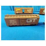 These are vintage Athearn HO scale model train boxcars