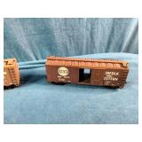 These are vintage Athearn HO scale model train boxcars