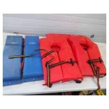 4 Life Jackets and 2 Hull Hugger Boat Bumpers