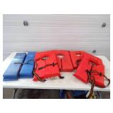 4 Life Jackets and 2 Hull Hugger Boat Bumpers