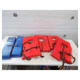4 Life Jackets and 2 Hull Hugger Boat Bumpers