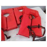4 Life Jackets and 2 Hull Hugger Boat Bumpers