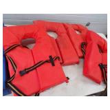 4 Life Jackets and 2 Hull Hugger Boat Bumpers