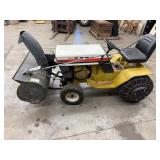 Sears 14/6 Garden Tractor With Snowblower Attachment - items in background of tractor not inc