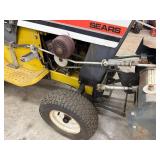 Sears 14/6 Garden Tractor With Snowblower Attachment - items in background of tractor not inc