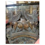 Beautifully Carved Wooden Dining Table with Winged Lion Base and Round Glass Top