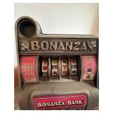 Vintage Bonanza Bank Slot Machine Coin Bank Gray Pink Countertop