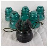 Five Hemingray No 42 Vintage Aqua-Blue Glass Insulators and One Hemingray 112 Cable Insulator