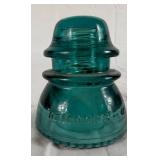 Five Hemingray No 42 Vintage Aqua-Blue Glass Insulators and One Hemingray 112 Cable Insulator