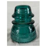 Five Hemingray No 42 Vintage Aqua-Blue Glass Insulators and One Hemingray 112 Cable Insulator