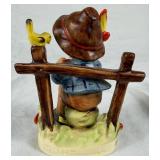 Goebel Hummel Figurines W. Germany -  'She Loves Me, She Loves Me Not' and 'Mountaineer'