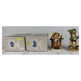 Goebel Hummel Figurines W. Germany -  'She Loves Me, She Loves Me Not' and 'Mountaineer'