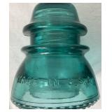 Five Hemingray No 42 Vintage Aqua-Blue Glass Insulators and One Hemingray 112 Cable Insulator