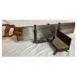 Three Antique E.C. Atkins Handsaws, 1 Disston Antique Saw, 1 Vintage 27' Disston Saw in Miter Box
