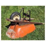 Sturdy Orange Wheelbarrow