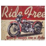 This Ride Free Garage Tin Sign