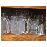 Lot of (2 Shelves) Wine Glasses, Brandy Glasses, Beer Glasses and Tumbler Glasses