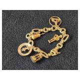 30.3-grams (total) 14K Gold Charm Bracelet
