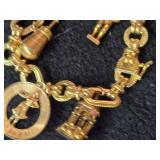 30.3-grams (total) 14K Gold Charm Bracelet