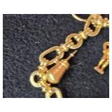 30.3-grams (total) 14K Gold Charm Bracelet