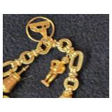 30.3-grams (total) 14K Gold Charm Bracelet