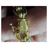 30.3-grams (total) 14K Gold Charm Bracelet